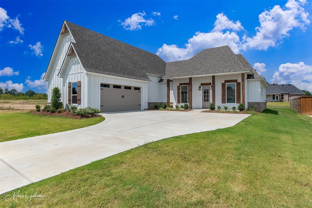 154 Laurel Valley Ln  Stonewall, LA  Plantation Hills

Agent is the owner & builder
Building Company: Distinguished Contractors, LLC (Agent & Owner)


Welcome to this stunning 1.5 stories,  4 bedroom, 3 bath home offering 2,426 sq. ft. of thoughtfully designed living space in the highly sought after Plantation Hills community. Every detail has been crafted to combine modern luxury with timeless charm.

 Interior Features
 • Open floor plan with tall ceilings & gorgeous cedar beams in the dining entrance & living room
 • Gas burning fireplace as the centerpiece of the living area with trace ceilings
 • Gourmet kitchen with farmhouse sink, pot filler, quartz countertops, large island, subway tile backsplash, coffee bar & stylish pendant lighting
 • Spacious bonus room with full bath perfect for guests, a media room, or a home office
 • Luxury vinyl flooring throughout, with ceramic tile in bathrooms
 • Cathedral ceiling with wooden beam in the master bedroom
 • Master suite retreat with oversized walk-in closet, glass-door shower, standalone tub & double vanities
 • Additional double vanities in remote full bath
 • Large laundry room designed for convenience & functionality

Outdoor Features
 • Covered front porch with peaceful views of the neighborhood lake
 • Professional landscaping & irrigation system for easy upkeep
 • Covered rear patio with built-in gas grill & sink a dream for outdoor cooking & entertaining
 • Spacious backyard with plenty of room to enjoy

This home combines modern finishes, natural wood accents, and thoughtful design to create the perfect balance of warmth, style, and everyday functionality.