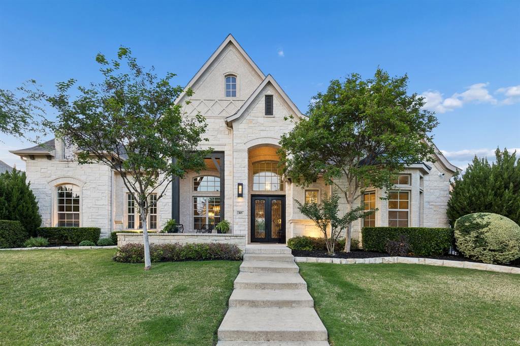 This is the one you have been waiting for! Beautiful single-story masterpiece nestled in Southlake’s highly coveted Winding Creek community. Enter through double metal and glass doors into a wide foyer that invites you into an open floor plan featuring wood floors, designer lighting, and abundant windows. The heart of the home is a chef’s dream kitchen, fully equipped with Wolf and Sub-Zero appliances, marble and quartz countertops, a large island, and gorgeous lighted cabinetry. This space flows seamlessly into a warm great room with a fireplace, as well as an adjacent entertainment wing boasting a game room, bar, and media room. For the professional, a private custom study offers the perfect quiet retreat.
The home offers four spacious bedrooms, each featuring its own ensuite bath, plus two half baths. Lutron lighting system that sets the perfect mood at the touch of a button. Outside, you will find a backyard paradise designed for relaxation and hosting, featuring a sparkling pool and spa with travertine decking, turf, motorized shades and an outdoor kitchen with a built-in grill, mini fridge and fireplace.  Additional - Steam Shower, generator, out shower and smart home features. Completing this exceptional property a three-car garage. Nestled in the heart of Southlake, you are within walking distance to Southlake Town Square, Central Market, movies, and fine dining.