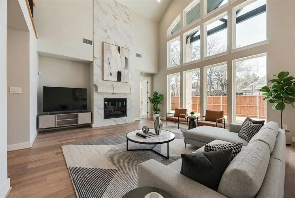 Welcome to this beautifully crafted, brand-new five-bedroom home in the desirable Providence Cove community JUST COMPLETED. Ideally located just off the Sam Rayburn Tollway, this home offers unmatched access to shopping, dining, and top-rated schools, along with neighborhood amenities including pickleball courts, a tranquil lake, and direct access to the McKinney Trail system. Step inside to a grand entryway with double front doors highlighted by a dramatic curved staircase that sets a sophisticated tone. A spacious family room featuring vaulted ceilings and a 2 story fireplace with tile stretching to the ceiling. The open-concept kitchen is a chef’s dream, complete with a large island, slab countertops, Shaker-style cabinetry, stainless-steel appliances, a five-burner gas cooktop with custom vent hood, pots and pans drawers, and a stylish tile backsplash. Downstairs media room and a home office or formal living. Upstairs gameroom & Children’s Retreat bonus room.  
Throughout the home, 8-foot interior doors, a modern front entry, rich wood floors, and a full oak staircase with wrought iron balusters enhance the sense of luxury. A private guest suite on the main level offers flexibility for visitors. The elegant primary suite includes a freestanding soaking tub, dual vanities with wall mirrors, a walk-in shower with designer tile, and his & her separate walk-in closets. A covered back patio is ready to entertain.
Designed with comfort and efficiency in mind, the home includes a built-in security system, sprinkler system, tankless water heater, R-38 insulation, and Energy Star certification.
This home blends modern design with everyday functionality in a thriving, connected community. Don’t miss your opportunity to own this stunning new construction home. Energy Star certified for low energy bills.