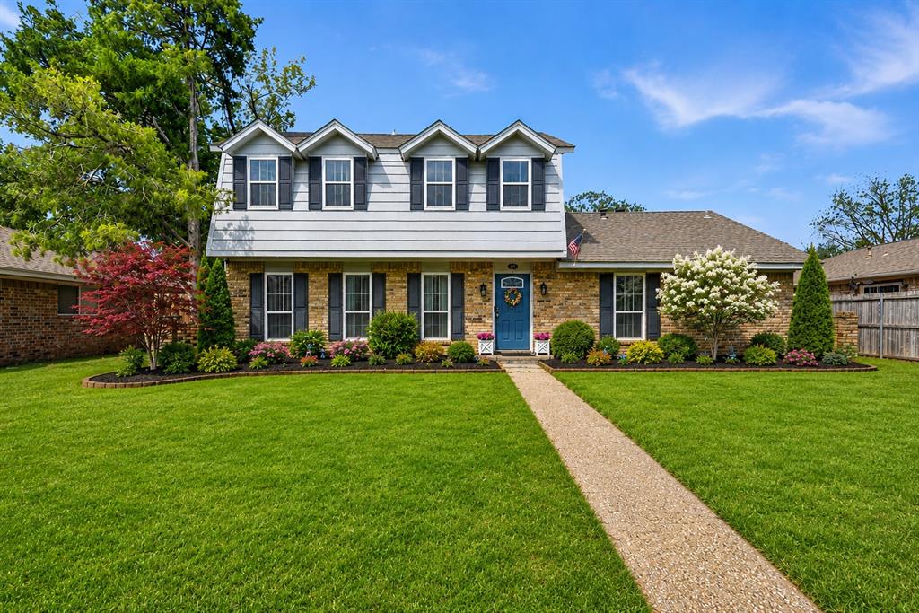 Beautiful and  completely remodeled 5 bedroom, 3.5 bath home in Hickory Creek, ready for you to call your own. This versatile floor plan features a thoughtfully converted garage, now serving as a second primary suite complete with a private ensuite bath, walk-in closet perfect for multi generational living. The inviting living room, centered around a cozy fireplace, flows seamlessly into the updated eat in kitchen, which boasts energy efficient built in appliances, new cabinetry, ample storage, and a bright breakfast nook with bay windows. The serene main primary suite offers a comfortable seating area, ensuite bath, and walk in closet. Upstairs, you’ll find three spacious bedrooms, a Jack and Jill bath, and a large family room ideal for relaxing or entertaining. Step outside to a private backyard patio, perfect for outdoor gatherings. Major recent updates include a new HVAC system and ductwork, windows, flooring, and interior and exterior doors. Ask your agent for supplemental information that will give additional details about the large list of new and replaced items.  This home combines comfort, flexibility, and convenience with three rear parking spaces. Income producing potential for this home as well. Please check with local ordinances if considering rental use. This is an opportunity you don’t want to miss just minutes from Lake Lewisville, coffee shop and fun restaurants. Enjoy the feel of country living in the midst of major cities and don’t forget the water sports and fishing in the area. Lewisville Lake is rated as excellent for catfish, crappie and white bass, and good for largemouth bass and striped hybrid bass. Large and small boat access and guides for a fee. Quick access to E35 interchanges to Denton, Lewisville, Little Elm and Dallas. About 1 mile from Westlake Park and Hidden Beach area.