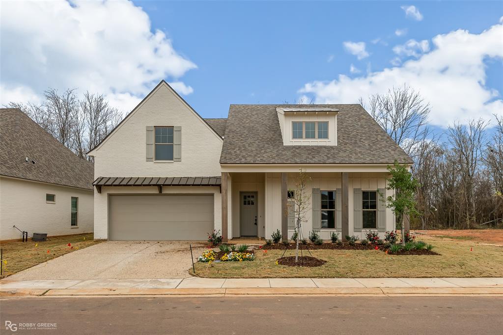 Stunning new construction home with great curb appeal - gated community - large open floorplan with abundant natural light throughout - spacious gourmet kitchen features modern fixtures, stainless appliances, custom cabinets, and lovely tile backsplash - custom details and neutral colors throughout - cozy fireplace with shiplap detailing in living room - relaxing primary suite features spa-like ensuite bath and huge walk-in closet - storage galore - large bonus room upstairs - enjoy time outside with large covered back patio - landscaping in backyard as well as full fence - this is truly move-in ready - located just minutes from North Bossier's shopping and dining, WK Bossier, and I220 for easy travel - come and see your dream home today!!