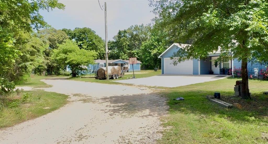 TURN KEY EQUESTRIAN PROPERTY..  Property contains two homes, a riding arena, 10 horse stalls , a foam insulated barn equipped with water and elect. Both homes have granit counter tops and are meticoulsy maintained. Property is fenced and cross fenced. There is also an awning and storage buildings and a small shop area attached to the barn with more storage. Property has a private drive leading to the home and it is surrounded by large mature tall pine trees. The manufactured home is a 1987 4 bed 2 bath containing 2994 sq. ft. fully updated new paint , cabinets , granit counter tops , walk in closets and a large master bedroom. The primary home is a newer 2020 year site built home containing 1650 square foot living space with 3 beds and two bath with a garage facing the front. Both homes are currently occupied this gives the buyer options of investment  for rental property or mother-inlaw seperate home. The barn could potentially be converted into a third home making it into a barndominium it is equipped with water and elect as well as foam insulated.  Don't let this property pass you by take advantage of all this property has to offer. TEXT ME FOR UTUBE VIDEOS
BOTH HOMES AND ALL BARNS , LOAFING SHEDS , STORAGE BUILDINGS IS INCLUDED FOR ONE PRICE TWO FOR ONE SPECIAL AVAILBLE TODAY.