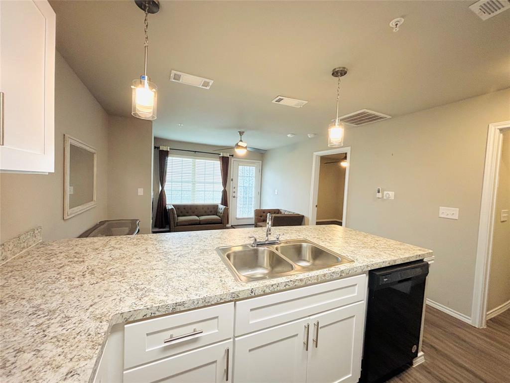 LOCATION! LOCATION! This rare 1-bedroom, 1-bath condo is ideally located in the heart of Dallas. Built in 2021, this well-maintained unit is situated on the First floor of Building 2 and offers a modern, comfortable living space. Inside, enjoy abundant natural light through large picture windows, stainless steel appliances, and a full-size washer and dryer. The condo is energy efficient and feature perfect for unwinding after a long day. With close proximity to bike trails, parks, shopping, and a wide variety of restaurants, plus an excellent walk score, this home delivers exceptional convenience and contemporary city living.