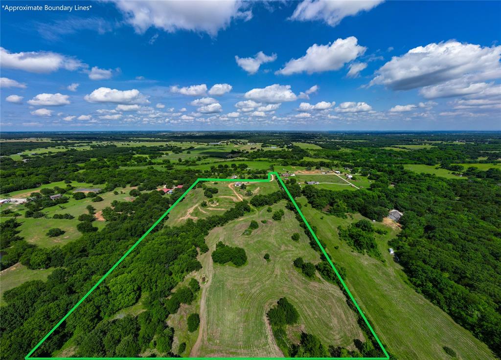 Located at 1932 County Road 222 in Gainesville, Texas 76240, this 19-acre property in Cooke County is a rare find for buyers seeking rural land in North Texas. Whether you're searching for a hunting property, a homestead, or agricultural acreage near Gainesville, TX, this listing delivers on every front.
The majority of the acreage is established in coastal bermuda grass, providing quality forage and excellent grazing potential for livestock. The property is fully perimeter fenced with barbed wire, making it ready for cattle, horses, or other livestock from day one. Thoughtfully placed food plots add immediate value for wildlife and hunters, making this one of the more turnkey hunting properties available in Cooke County, Texas.
The land features a stock tank that draws wildlife year-round, including mature whitetail deer, adding both recreational and practical appeal for serious hunters. A natural stand of roughly 4 acres of pecan trees brings shade, beauty, and classic North Texas character to the property. A small established garden gives the next owner a head start on the homesteading lifestyle that this land was made for.
In 2023, the sellers added a manufactured home, septic system, and supporting infrastructure — meaning this Gainesville, TX acreage is move-in ready from day one. The property also includes a storm shelter, a welcomed addition in North Texas. Step out back onto the covered wood deck and take in a beautiful view of the property — the kind of setting that makes it easy to picture calling this place home.
Conveniently located near Gainesville, Texas, with easy access to shopping, dining, and services, this property strikes the perfect balance between rural privacy and everyday accessibility. If you're searching for land for sale in Cooke County, TX, or hunting land near Gainesville, this is a property worth a close look.