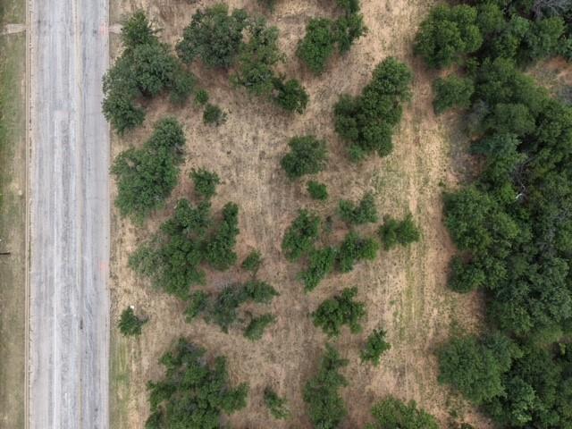 Discover the perfect place to build your dream home on this gorgeous lot filled with mature trees and natural beauty. Enjoy the peaceful setting, abundant shade, and privacy that only established trees can provide. This property offers a picturesque backdrop and plenty of space to bring your vision to life. Conveniently located with easy access to local amenities. Don't miss this opportunity to own a beautiful lot ready for your dream home.