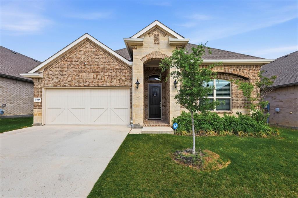 Move-in ready and designed for modern living, this spacious 4-bedroom, 2.5-bath home offers comfort, style, and convenience in a prime Argyle location. Featuring a desirable split-bedroom floor plan, everyone can enjoy their own private space. The open-concept layout is perfect for entertaining, seamlessly connecting the kitchen, dining, and living areas. The kitchen boasts abundant cabinetry, a pantry for extra storage, quartz countertops, and a stylish side counter ideal for a coffee bar or serving station. The primary suite provides a relaxing retreat, while the additional bedrooms offer flexibility for family, guests, or a home office. A 2-car garage with epoxy-coated flooring adds durability and a polished finish. Step outside to the covered patio, where you can unwind and enjoy peaceful evenings. Conveniently located near major highways and interstates, this home offers easy access to Tanger Outlets, Buc-ee’s, Texas Motor Speedway, and is less than 45 minutes from DFW Airport. This beautiful home is ready to meet all your needs.