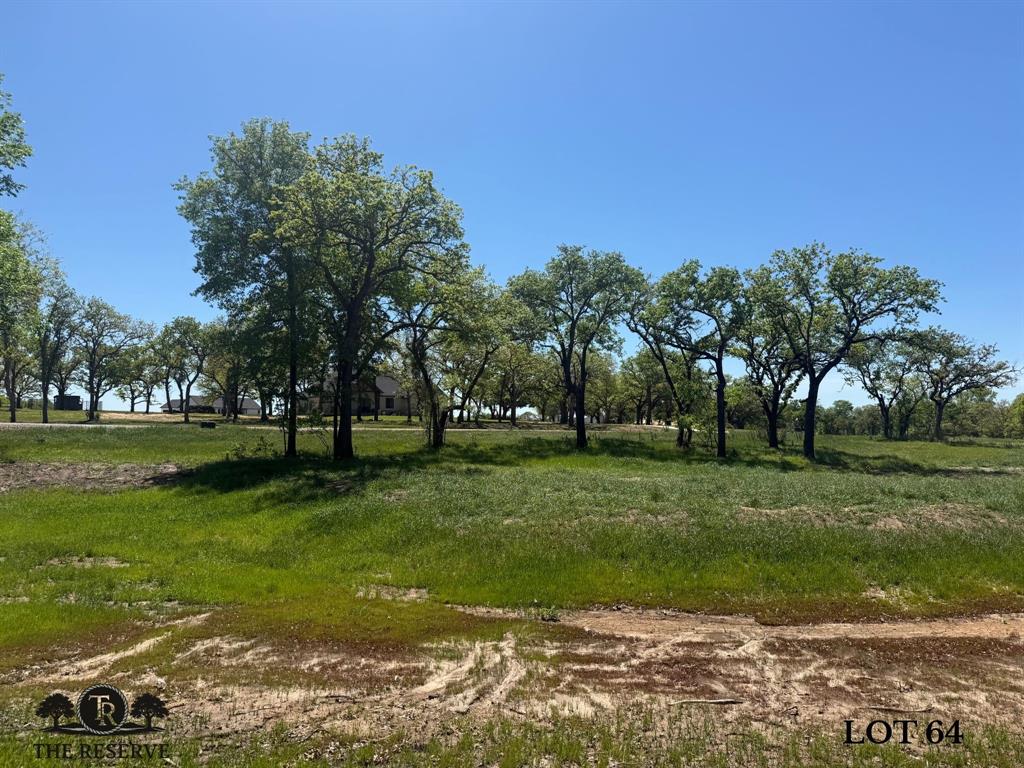 At the end of the culdesac in The Reserve at Taylor Ranch, your Private Slice of Parker County Paradise awaits. This lot features a turn key lot that has been selectively cleared ensuring beautiful and well manicured oaks remain. Ready for your build project! Nestled in the quiet countryside of Springtown and within the coveted Weatherford ISD, offering a rare opportunity to own acreage tracts that balance privacy, beauty, and freedom, all just minutes from town. Ranging from hilltop parcels with sweeping views to shaded, wooded retreats;  each one unique and full of potential. With rolling topography that rises nearly 90 feet, the backdrop is breathtaking, offering unforgettable Parker County sunsets and a peaceful rhythm of life that feels miles away from the noise, yet only 20–25 minutes from Weatherford and close to Springtown’s local dining, shopping, & amenities. The Reserve is a true escape, a neighborhood that prioritizes privacy, space, & quality. Build your dream home on your timeline with deed restrictions, no HOA, and the freedom to create a lifestyle that suits you. Enjoy underground electricity, no water bills, well and septic-ready lots, & Next Link Fiber Optic Connectivity, all while being nestled in a quiet community. It’s the kind of place where neighbors wave, stars shine brighter, and the land works with you, not against you. The Reserve at Taylor Ranch isn’t just a place to live; t’s a place to belong. Evenings here feel like stepping back in time, where you can wander under wide Texas skies, catch lightning bugs in the dusk, and enjoy the kind of quiet that lets you hear the breeze through the trees. This is your invitation to slow down, spread out, and savor the simple moments. Come walk the lots, take in the views, and imagine the possibilities. New single-family construction must have a minimum of 1,700 square feet. No Barndominiums.