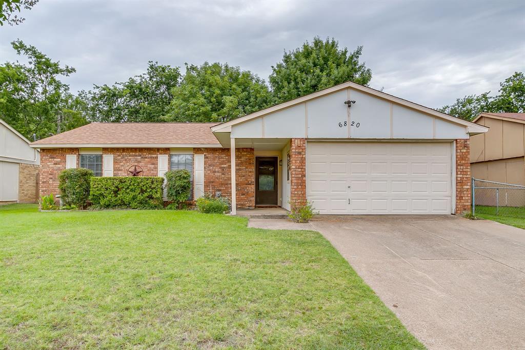 Investor Special with Major Updates Already Completed! Great opportunity to add value to this 3-2-2 brick home located in a quiet, established neighborhood. The spacious living area features a beautiful wood-burning fireplace and opens to an eat-in kitchen with a generously sized breakfast area. Three well-proportioned bedrooms and two full baths provide a functional layout with plenty of potential. While the home is primarily in need of cosmetic updates, several significant improvements have already been completed, including replacement of all cast-iron plumbing, a new water heater installed in June 2026, and the roof replaced in 2023.  The backyard is a nice size with large trees, storage and patio.  The patio cover is in need of repair or may need to be completely removed.  Property is being sold as-is and is priced accordingly,  seller will make no repairs. Excellent opportunity for investors, flippers, or buyers looking to customize a home to their own taste.  Located near parks, shopping and dining with quick access to major highways.  Zoned to highly rated Birdville ISD.  No HOA