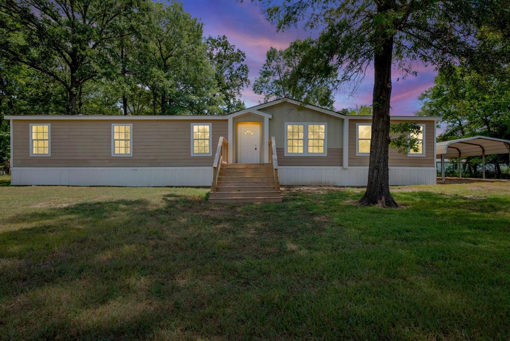 Welcome home to this beautifully maintained 4-bedroom, 3-bath residence offering over 2,100 square feet of inviting living space on more than half an acre. Fresh paint and brand-new carpet provide a fresh, modern feel, making this home truly move-in ready from day one. Seller is looking at all offers! Designed with both comfort and functionality in mind, the spacious floor plan offers generous living areas, well-appointed bedrooms, and three full bathrooms to accommodate family and guests with ease. Natural light fills the home, creating a warm and welcoming atmosphere throughout. Step outside and discover one of the property's standout features—a large back deck perfect for weekend barbecues, entertaining friends, or simply unwinding. With over half an acre, there's plenty of room for kids, pets, outdoor activities, or even future additions. Homes that combine space, updates, and value like this don't come along often. If you're looking for a home that offers room to grow and modern updates, this is the one you've been waiting for! Bring all offers!