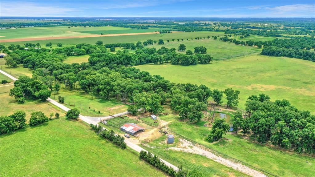 a beautiful 360 ac ranch located in NE Grayson Co. close Red River. Ranch is a short drive from Denison or Bells. The ranch has been used for stockers and what pasture in the past some sprigging in Coastal has been done also, lots of beautiful pecan trees, 2 creeks, and some of the most productive land in the area. There is a set of corrals and holding pens at the headquarters along with equipment shed. The north boundary of the ranch has frontage on Elmore Rd and Carpenters Bluff runs along the east side. The ranch is cross fenced and lots of recent fences. The soils are Okay, Bastrop, Redlake and Elbon. Smith Creek crosses the ranch in the southern portion  and Choctaw Creek forms the south boundary. All types of wildlife can bee seen on the ranch. One of the few larger tracts of land on the market today.