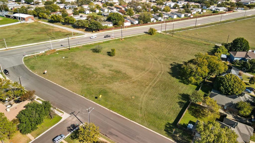 Opportunity to lease as well with build-to-suit potential (terms negotiable) located on the growing east side of Denton, directly across from Billy Ryan High School and conveniently positioned near Loop 288, I-35W, and Highway 380. The property is within approximately five miles of University of North Texas and Texas Woman's University, offering strong visibility and access to a growing residential, student, and commercial population. Zoned MN (Mixed-Use Neighborhood), the site allows for a variety of potential uses including retail, office, medical, and other commercial applications (buyer to verify permitted uses with the City of Denton). Utilities and infrastructure are available nearby to support future development. A previously initiated concept plan reflects the potential for one four-unit building and two additional eight-unit buildings, highlighting the flexibility and investment potential of the site. New plat completed. Original survey available.