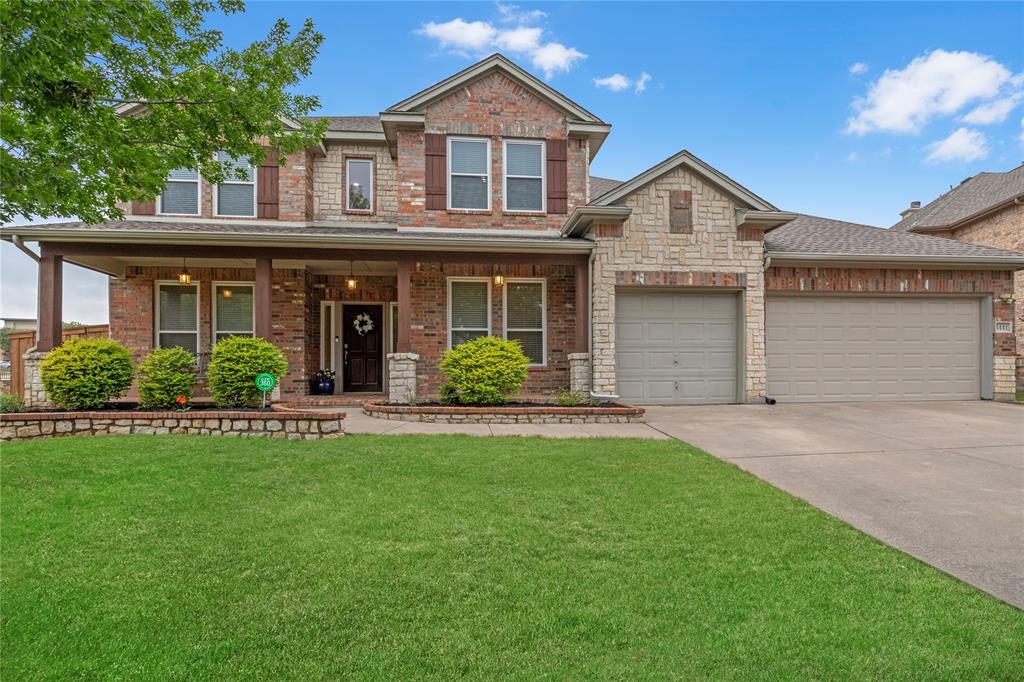*RESORT-STYLE POOL + OUTDOOR LIVING, KITCHEN!!!*BACKYARD OASIS!!*3-CAR GARAGE!!*
Welcome to this exceptional 5-bedroom, 4-bath home in Keller’s highly sought-after Heritage community, offering refined design, effortless flow, and a spacious 3-car garage.

Inside, soaring ceilings and rich hardwood flooring complement a light-filled living room anchored by a dramatic floor-to-ceiling stone fireplace with both wood-burning and gas capabilities. The space flows seamlessly into the chef’s kitchen, featuring crisp white cabinetry, abundant counter space, a breakfast bar peninsula, gas cooktop, and a butler’s pantry connecting to the formal dining area. 

The primary suite offers a private retreat with a custom barn-style door leading to a spa-inspired ensuite complete with a frameless glass walk-in shower, bench seating, dual showerheads with rainfall feature, floor-to-ceiling designer tile, and a custom dual-sink vanity with vessel sinks and stone countertops, along with an oversized walk-in closet. A secondary bedroom, full bath, and dedicated office or flex space complete the first floor, while upstairs features spacious bedrooms, a large family room with wet bar and beverage fridge, and a separate media or game room with a speaker system.

Step outside to a truly exceptional backyard retreat designed for relaxation and entertaining. A sparkling pool with an extended tanning ledge and water feature anchors the space, surrounded by expansive decking and low-maintenance turf. The oversized covered patio showcases rich wood beam detailing, ambient string lighting, and a fully equipped outdoor kitchen with bar seating—creating a seamless indoor-outdoor experience. A dedicated fire pit area adds the perfect finishing touch to this unforgettable outdoor living space.

Residents of Heritage enjoy amenity-rich living just minutes from Alliance Town Center, H-E-B, top-rated schools, dining, and major roadways.