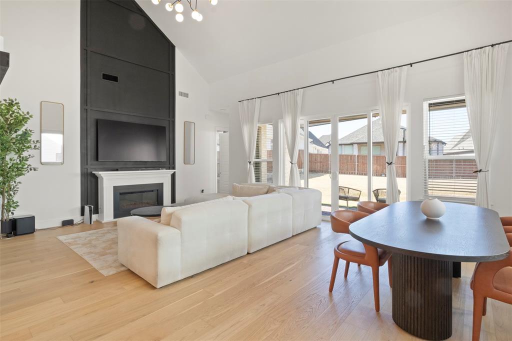 Stunning East-Facing Multi-Generational Home on Oversized Cul-de-Sac Lot with Serene Wooded Views

Welcome to this exceptional two-story, East-facing home positioned on an oversized cul-de-sac lot with breathtaking views of the community’s wooded greenbelt. Designed for comfort and entertaining, this multi-generational home showcases elevated finishes and a bright, open-concept layout that feels spacious and inviting.

From the moment you step inside, you’ll notice thoughtful builder and owner upgrades that enhance both style and functionality.
At the heart of the home is the luxury kitchen, featuring an oversized island, quartz countertops, upgraded backsplash, pot filler, under-cabinet lighting, and upper cabinets with accent lighting. The kitchen flows seamlessly into the expansive family room, where a custom fireplace mantel creates a striking focal point.

Designed with entertaining in mind, custom sliders open to an extended covered outdoor living area and an oversized backyard ready for your vision of a pool, garden, or outdoor kitchen.
A dedicated entertainment room downstairs offers flexibility for movie nights or game days. 
Upstairs, a spacious loft provides options for a secondary living area or playroom. Three oversized bedrooms each feature their own full bath, offering comfort and privacy.

The primary suite is a true sanctuary, complete with a spa-inspired bath featuring a freestanding soaking tub and separate shower and refined finishes that create a calming retreat at the end of the day.
A secondary downstairs bedroom, currently used as a home office, adds versatility and multi-generational appeal.

With designer upgrades throughout, flexible living spaces, and serene natural views, this home delivers the perfect blend of luxury, functionality and timeless style all in one exceptional package.

Sandbrock Ranch HOA includes a workout facility, 2 pools & playgrounds, dog park, a unique 3 story treehouse and 7 plus miles of trails.