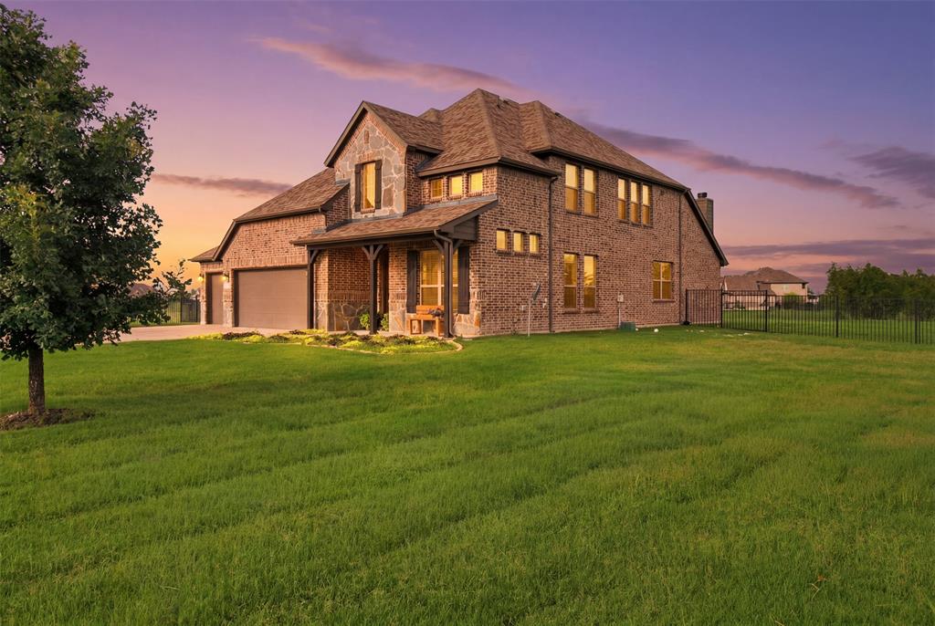 Start your mornings on the covered back patio with a cup of coffee as the sun rises over your backyard, then end the day on the front porch watching the Texas sunset paint the sky. Set on 1.23 acres, this is the kind of property that invites you to slow down and enjoy the moments that matter.

Inside, the thoughtful layout gives everyone room to spread out. The private primary suite downstairs creates a peaceful retreat, while upstairs offers additional bedrooms and a spacious family room that's perfect for movie nights, sleepovers, and gathering with friends and family. A front flex room provides space to work, create, or adapt as your needs change over time.

Life here extends far beyond the property lines. Spend weekends fishing at the neighborhood pond, exploring more than 100 acres of nature preserve, or riding dirt bikes, side-by-sides, and ATVs with family and friends. Raise a few chickens, build the shop you've always wanted, and enjoy a lifestyle that blends freedom, adventure, and community.

This isn't just a home on acreage. It's a place to put down roots, make memories, and enjoy the kind of everyday moments that are becoming harder to find.