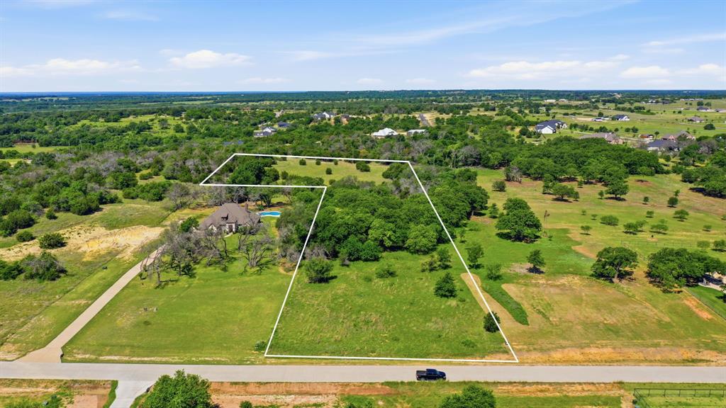 Beautiful 5-Acre Lot in Shadle Estates, Poolville, TX — Bring your own builder and design your dream home on this spacious 5-acre parcel in Shadle Estates Community, offering a perfect blend of open land and mature trees for versatile building options, ample yard space, and natural beauty. No HOA  with electric on the street. This property provides privacy and country living while staying close to amenities, with Weatherford just a short 20-minute drive for shopping, dining, and services.