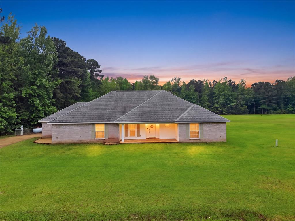 **WITH FAVORABLE OFFER THE SELLERS ARE WILLING TO GIVE ALLOWANCE FOR UPDATES ***FRESH PAINT THROUGHOUT!***Motivated Sellers****** Will entertain all offers **561 Wells Rd in Haughton delivers the space buyers are looking for with 4 bedrooms, 3 full bathrooms, and approximately 2.2 acres of usable land. This custom built home features two primary bedrooms, offering flexibility for a variety of living arrangements. The open concept kitchen flows into the main living area and includes a large pantry, making it ideal for both everyday living and entertaining. Multiple additional rooms provide excellent options for office, hobby, or flex space. Recent updates include a new septic pump, and the system has been recently serviced. Let’s not forget about the whole home generator. Outside, the property continues to impress with an approximately 1050 square foot outbuilding that can serve as a workshop, storage space, or more. The acreage provides room to spread out with potential for future use. If your buyers need space, functionality, and land in Haughton, this one checks the boxes.
