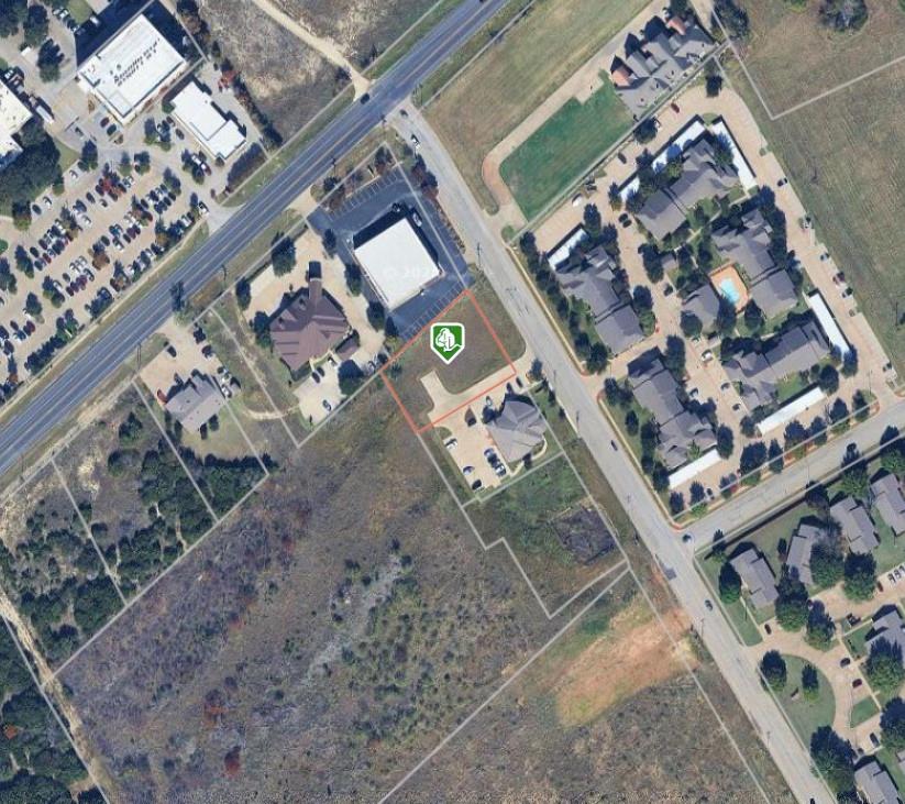 Finished Pad Site, ready to build commercial Lot, in the fast growing City of Granbury!  Conveniently located across from Lake Granbury Medical Center, just off of Paluxy Hwy and TX Hwy 144.  The property is .511 acres, and has some parking lot already constructed.  Many medical offices are located close by as well as commercial, residential, and multi family properties.  This site is ready to build, water tap is in place, entrance is complete, and some parking lot has been constructed.  Need more land?  There is an additional 8+ acres directly to the rear of this property that is also available,  Current zoning is light commercial. Development plans and Site plans are available.  Property held by receiver, subject to Judicial Approval by the Hood county Court at Law.  All information in this listing is deemed accurate but should be verified.