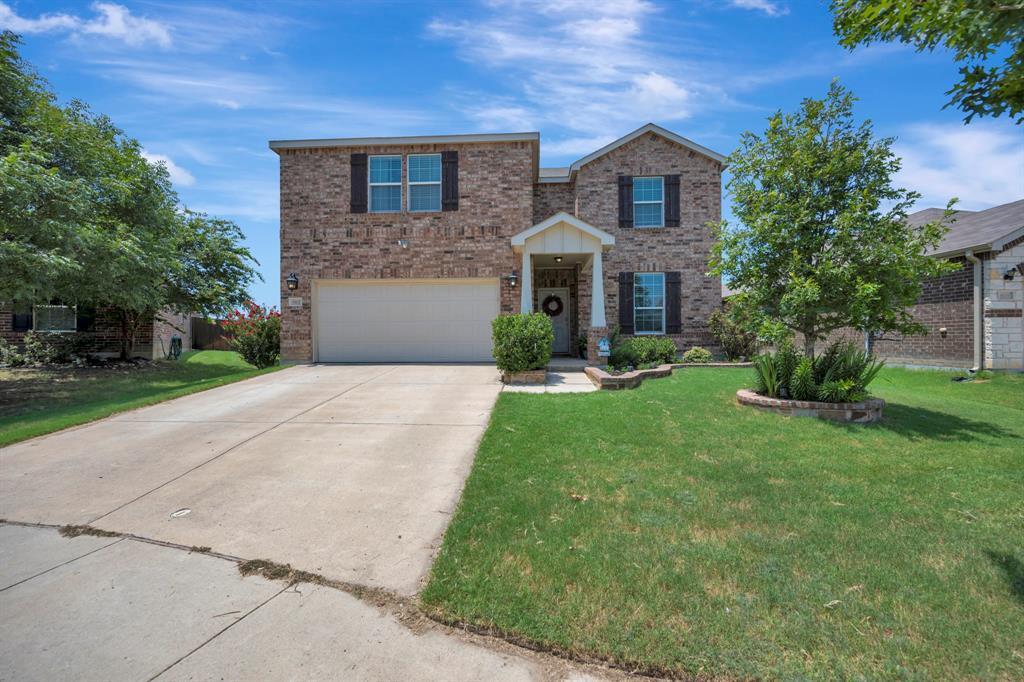 This flexible floorplan offers 4 bedrooms, a dedicated office, and plenty of space for everyday living and entertaining. The private office features French doors, creating the perfect work from home space. The kitchen is equipped with granite countertops, a breakfast bar, and a pantry, opening to the inviting living room with laminate flooring and a beautiful stone wood burning fireplace. The spacious primary suite provides a relaxing retreat with dual vanities, a garden tub, separate shower, and a massive walk in closet. Upstairs, you'll find a large game room along with generously sized secondary bedrooms, offering plenty of room for everyone. Step outside to enjoy the covered patio overlooking the large backyard, ideal for outdoor gatherings, play, or gardening. Located in highly sought after Keller ISD, this home is just minutes from Alliance Town Center and Presidio shopping with convenient access to Costco, HEB, dining, and entertainment. Don't miss your opportunity to make this exceptional home your own. Schedule your private showing today!