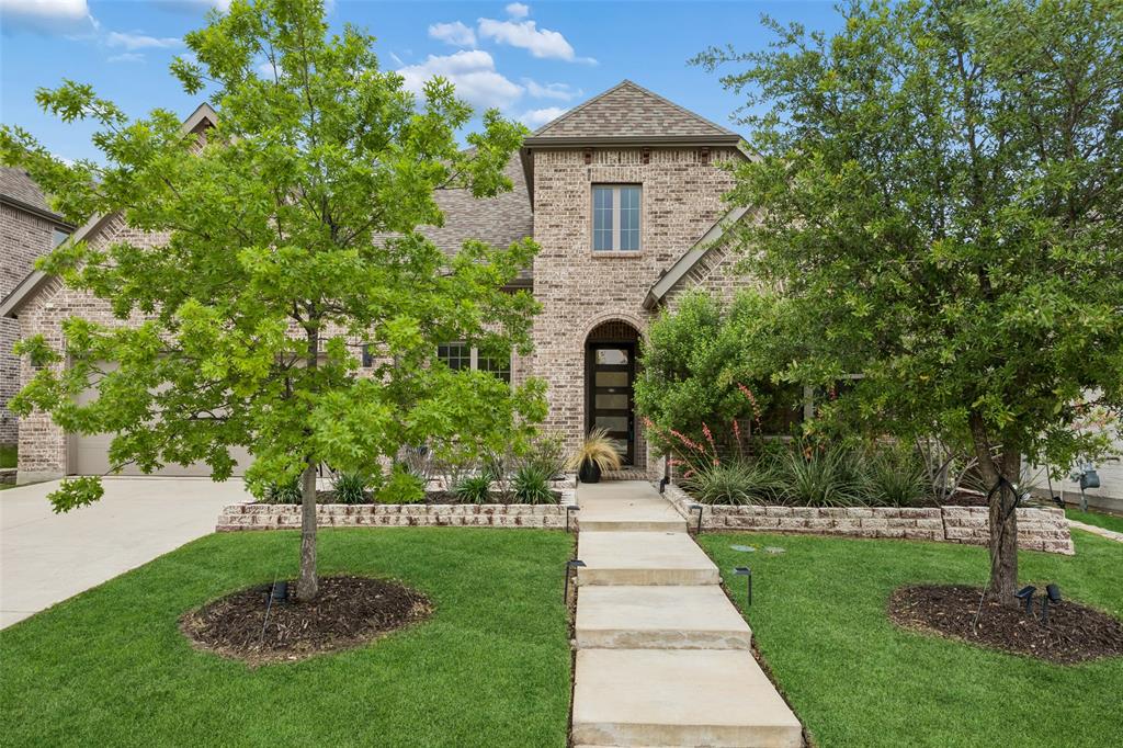 Discover refined living in this beautifully designed 3-bedroom, 3-bath residence in McKinney, where modern elegance meets everyday comfort. Situated on a desirable 70-foot lot—one of only a few 3-bedroom homes in the neighborhood with this added space—this property offers both distinction and functionality. Inside, a spacious living room with a vaulted ceiling creates an airy, light-filled setting ideal for relaxing or entertaining. The open-concept design flows seamlessly into a chef-inspired kitchen, thoughtfully appointed with a 6-burner gas range, double oven, integrated griddle, large island with seating, built-in appliances, designer lighting, and abundant storage. A bright breakfast nook enhances this inviting central space. A dedicated home office provides flexibility for work or creative use. Generously sized rooms throughout the home add to the sense of comfort and openness. The primary suite serves as a private retreat, featuring a spa-inspired bath with dual sinks, separate vanities, a soaking tub, and a dual shower with both a rain head and wall-mounted fixture, along with a spacious walk-in closet. Additional features include a well-appointed laundry area and a versatile oversized wash station for everyday tasks or outdoor cleanup. The home is equipped with modern technology, including pre-wired speakers in the home, garage, and patio with an additional run to the yard, wireless access points for whole-home WiFi, and prewiring for PoE security cameras. Enjoy the private backyard with a covered patio and natural gas connection, ideal for outdoor cooking and gathering. Located in a sought-after community with appealing amenities and convenient access to parks, shopping, and dining, this home offers a well-rounded lifestyle of comfort and convenience. 3D tour and video available online.