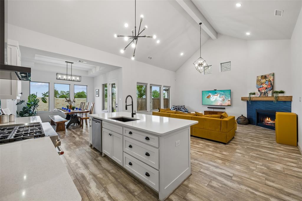 Home is also listed for rent. This custom McKinney home features the ultimate wish list showstoppers you won't find anywhere else. Turn-key, completely vacant, and ready for an immediate, fast close. The Ultimate Utility & Dog Wash: Forget basic laundry. This oversized, hyper-functional command center features a versatile, built-in wash station perfect for muddy paws or heavy-duty cleanup. Architectural Drama: A breathtaking main living space dominated by soaring 20-foot+ cathedral vaulted ceilings, creating an immediate, jaw-dropping sense of grand scale and natural light. A True Culinary Powerhouse: A chef’s kitchen built for serious entertaining. Loaded with a premium 6-burner gas range, integrated griddle, commercial-style vent hood, double oven, massive seating island, and a bright breakfast nook. Work, Rest, and Smart Connectivity. The Layout: Flows effortlessly into a dedicated, private home office, generous secondary bedrooms, and a pristine blank canvas interior ready for your personal touch. Primary Retreat: A true sanctuary boasting a spa-inspired bath with a deep soaking tub, separate vanities, and an oversized dual shower with both a rainfall head and wall-mounted fixture. Tech-Forward: Fully pre-wired with whole-home WiFi access points, Power over Ethernet (PoE) security camera wiring, and integrated speaker zones spanning the interior, garage, and back patio. Outdoor Living & Location: Enjoy a private backyard retreat with a covered patio, direct natural gas connection for easy grilling, and plenty of space on a premium lot. Located in a sought-after McKinney community with top-tier amenities, parks, and dining just minutes away. Easy to tour and ready for a quick closing. Experience the scale in person today, or view the 3D virtual tour and video walkthrough online.