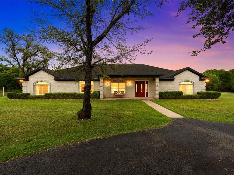 Must See to Appreciate.!!!! This 4-bedroom, 3.5-bath home offers comfort, privacy, and room to grow—all set on 2.5 secluded acres in a well-established neighborhood. Designed with functionality in mind, the home features two separate living areas, including a cozy den with a wood-burning fireplace, perfect for relaxing evenings.
The large kitchen includes an eat-at bar and flows seamlessly into the dining area, making it ideal for gatherings and everyday living. Bedrooms are generously sized, with ample closet space and well-appointed walk-in closets. The private master suite is thoughtfully positioned on the opposite side of the home and includes an adjoining room—perfect for a nursery, office, or additional bedroom.
Step outside to enjoy a peaceful backyard with a garden area just off the porch, where you can take in the surrounding nature and frequent wildlife sightings.
In addition to the home, the property features a 2-car carport, a separate workshop with a roll-up door, and a large metal shop equipped with an electric door and side awning—ideal for covered parking, RV storage, or housing equipment.
If you're looking for space, privacy, and versatile amenities, this property delivers it all.