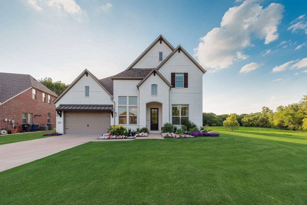 Experience sunset & lush views in this gorgeous MI Home in Heatherwood Estates in Prosper ISD! With the privacy & serenity of country living, but with the conveniences of the city, this amazing home offers 5 oversized bedrms + office, bonus rm, 5 bathrms, game rm & media rm. Pull up to a private wooded cul-de-sac & extended driveway for timeless & charming curb appeal with white brick elevation, manicured flower beds, golf course like grass, mature trees and green pastures! With so many tasteful & elegant design choices throughout, this home truly feels inviting, elevated, intentional & personal. Upon entry, you will find vaulted ceilings in the foyer with a grand staircase & balcony, the perfect work from home office with custom trim and a stunning formal dining featuring treelined views, mirroring the amazing accent wall. Owners recently had entire home painted, trim, installed new carpet, light fixtures, countertops & fresh landscaping!! Boasting upgraded & resilient white oak hardwood flooring throughout the living areas, the living room features a stately gas log fireplace and built-ins with ample natural light & large windows with storage throughout. Gourmet chef's kitchen has gas cooktop, stainless steel appliances, quartz counters, apron sink, floating shelves, oversized island & large pantry! Primary suite has bay window and sitting area, with the bathroom offering double vanities, walk in shower with two entrances, & tub. Downstairs, includes 2 bedrooms, office & bonus room for a great gym space and upstairs features 3 bedrooms, a large game room with storage + built in bunkbed, & a full size media room with projector, speakers, & screen included! This dreamy backyard has extended concrete & pavers, gas line for grilling, storage shed, wrought iron fence & scenic views! Situated in an excellent location of McKinney, it is walking distance to community & city parks, trails, pool, playgrounds, schools, & retail! Don't let this one go, it's too good & rare!