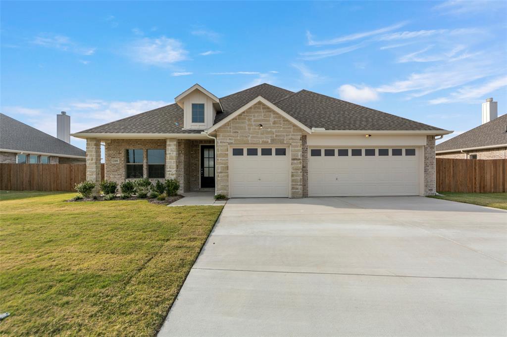 Welcome to Robbie Hale Homes newest subdivision, Meadow Ridge Estates,  located in Josephine. 308 Timber Ridge Drive is situated on a one third acre homesite with NO HOA or MUD or PID tax. This 2265 square foot home has 4 bedrooms, 2 bathrooms and a 3-car garage. From the brick fireplace to the spacious open kitchen with wood floors, this plan is well thought out. The 18 by 13 foot primary suite of this house features sloped ceilings, dual vanities, a soaking tub, and a separate walk-in shower. With 4 bedrooms, your family will have room to grow or you’ll have the extra space for that home office. Experience the welcoming atmosphere of Collin County and the strong school district of Community ISD. With the homes prime location, you’ll enjoy the perfect blend of peaceful living and urban convenience. The choice to buy this home is simple. Builder to pay for Title Policy, Survey and Up-to $20k in Seller Concessions.