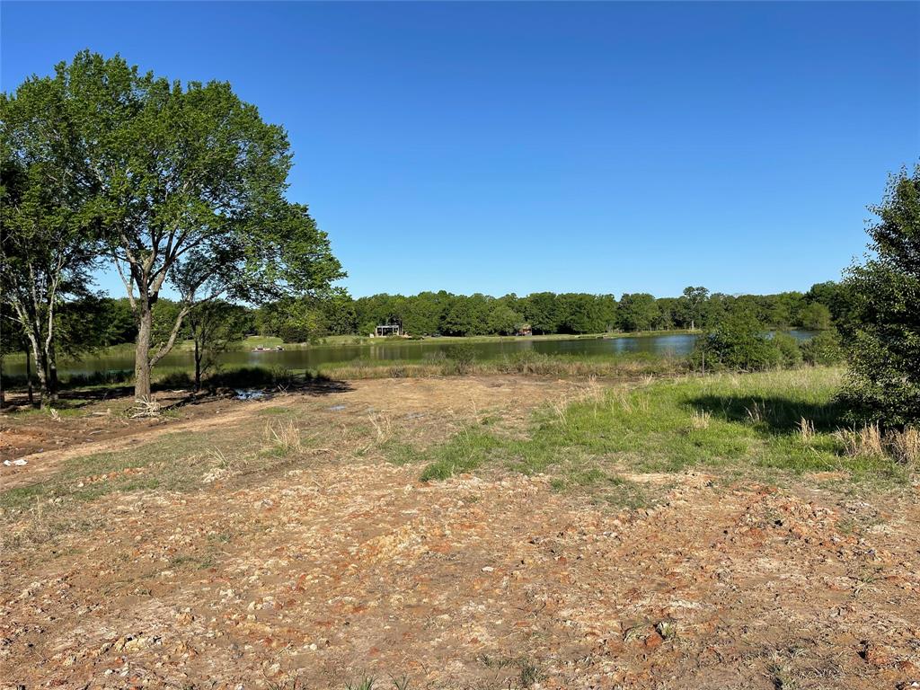 This 3-acre beautiful property offers the perfect place to build your custom dream home! Enjoy peaceful, country living on this homesite within minutes of Emory and Lake Fork. Currently this property is part of a 7.45 acres tract - which the owner will have subdivided. All pictures reflect the entire 7.45 acres. The 7.45-acre property backs up to a 12-acre lake with a dock, has electricity to the site and is supplied by Bright Star water and the front features 300 feet of road frontage, a pipe fence and a gated entry with a recently added concrete driveway that leads to a potential home site. If subdivided, some property details may change. The property can be purchased as the entire 7.45 Acres, MLS #20607378. Another option, if subdivided, is a 4.4-acre tract MLS #20607935.