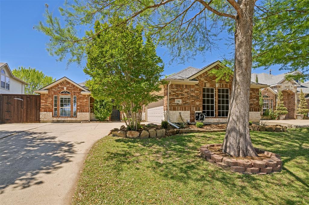 This versatile home offers a flexible floor plan with 3 bedrooms plus a study—ideal as a home office or easily used as a 4th bedroom. Enjoy 10-ft ceilings in the main living areas and an expansive open-concept living and dining space perfect for entertaining. The kitchen features granite countertops, a stainless steel appliance package, dedicated coffee bar area, and ample cabinet space. Laminate wood flooring runs throughout with ceramic tile in the bathrooms. The spacious primary suite includes a jetted tub, separate stand-up shower, and dual closets & back-lit mirrors. A backyard retreat offers a beautiful covered patio with built-in grill—perfect for relaxed sunset evenings and outdoor gatherings! Easy access to LBJ & I-30!