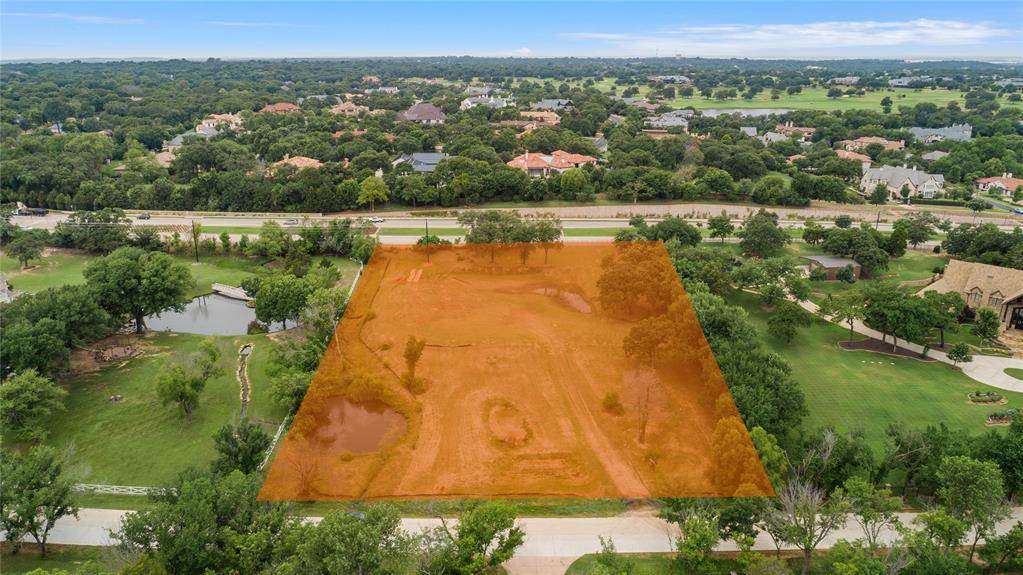 Unparalleled opportunity to own 2.489 acres in the ultra-exclusive, Maranatha Estates! If you are seeking a truly elite lifestyle, this is the private estate lot for you. This expansive property boasts dual ponds and a lush canopy of trees, offering unparalleled seclusion from neighboring lots. This estate is surrounded by multi-million dollar residences, ensuring a future of unrivaled elegance and distinction. The generous acreage provides ample space for a future magnificent estate, complete with a luxurious backyard pool, private pickleball courts, and endless possibilities for customization. Ideal for discerning developers, elite builders, or individuals with a vision for extraordinary living, this rare lot is a gem that seldom comes to market. Positioned in a coveted area renowned for its proximity to fine dining, upscale shopping, and major highways, this lot is an exceptional find. Enjoy living where exclusivity and luxury are a way of life.