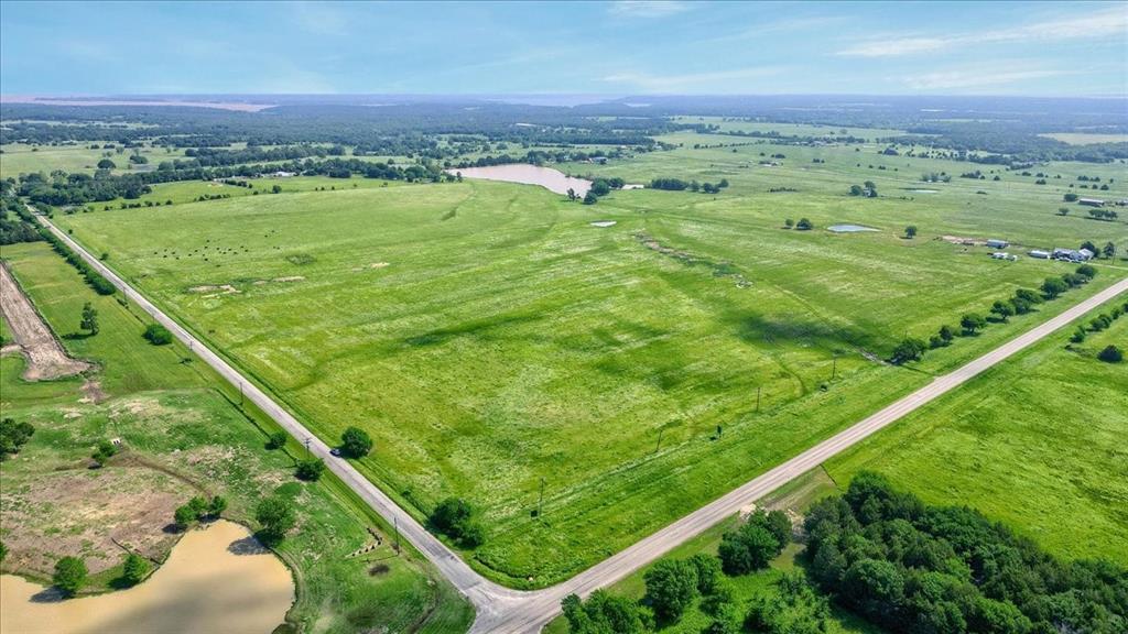 Stunning 123+ Acre Estate with Lake and Development Potential! Discover the perfect blend of tranquility and convenience with this sprawling 123+ acre property, ideally located with extensive road frontage on Fm 901 and Rock Creek Road. This property boasts a large, beautiful lake, perfect for fishing with bluegill, bass, and catfish. Fully fenced and cross-fenced, the property offers lush, green pastures, ideal for grazing cattle and equine operations. It features multiple incredible build sites for your dream home and has excellent development potential for the future.Located just minutes from Lake Texoma and Rock Creek Golf Course, you'll enjoy both natural beauty and easy access to amenities. Water service is provided by Northwest Grayson Water (WCID Number #1) along Rock Creek Road.This property is a rare find and a true gem for anyone looking for space, privacy, and potential!