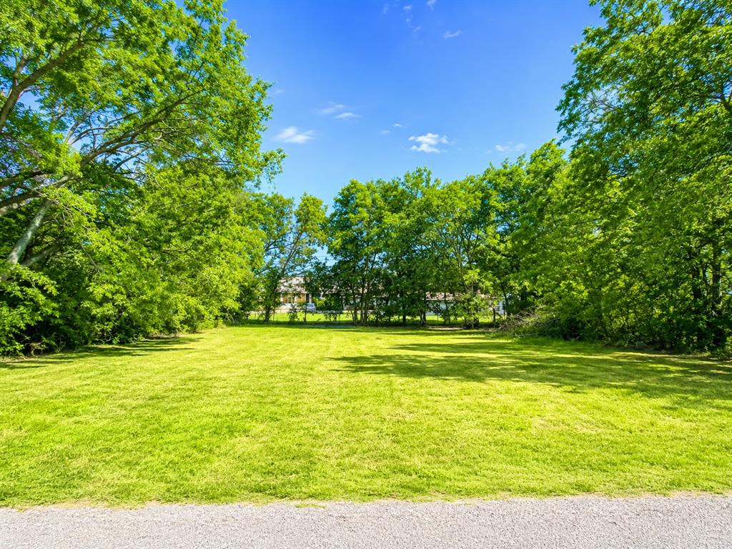 Excellent opportunity to develop a commercially zoned lot located in the established Burney Addition area in town just east of downtown Bonham.        A home previously occupied the property, offering potential access to existing utility infrastructure, subject to buyer verification with utility providers. Approximately 11,252 square feet (0.26 acres), this level lot provides an ideal setting for a variety of commercial uses or potential development opportunities. Conveniently located near downtown Bonham, schools, shopping, and local amenities. All information contained herein in is deemed reliable but not guaranteed. Buyers are to verify and complete due diligence, property is being sold as is where is with no express or implied guarantees.