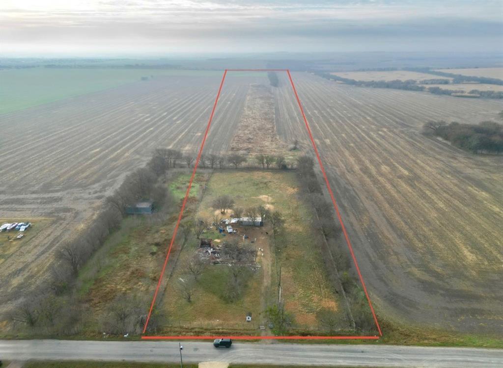 This is the caption 11.131 acres for sale with approximately 188 ft of road frontage and 2,423 ft of depth. Enjoy rural tranquility while still having convenient access to everyday essentials and major transportation routes—just a short drive to Waxahachie and Interstate 35E.
No known restrictions make this property a blank canvas for your future plans. With 11+ acres, the land meets Ellis County ag-exemption requirements, and the favorable tax rate makes this opportunity even more attractive.