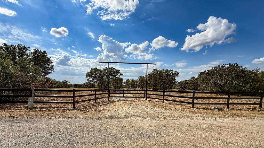 80-Acre Hunting & Recreational Property Near Lake Brownwood, Texas
Discover your Hill Country hunting paradise on this exceptional 80-acre property just 1.26 miles from Lake Brownwood on CR 594. This turn-key Lake Brownwood hunting land features mature live oak and hardwood trees, thriving white-tailed deer, wild hog, and turkey populations, along with established utilities and functional infrastructure.
Unlike typical raw land listings, this property features water and electric meters, a 1-acre stock tank, equipment shed, conex box, and rail car—everything you need to start your hunting retreat, ranch operation, or outdoor business immediately. No development delays. No infrastructure guesswork. Just ready-to-use Hill Country acreage.
LOCATION & ACCESS
Centrally positioned in Texas Hill Country with convenient proximity to major cities: 18 miles to Brownwood, 65 miles to Abilene, 140 miles to Waco, 141 miles to Fort Worth, and 157 miles to Austin. Perfect for weekend hunting trips from Dallas-Fort Worth or Austin while maintaining true privacy and seclusion.
PROPERTY FEATURES

80 acres of pristine Hill Country land
Mature live oak and hardwood trees throughout
Active wildlife: white-tailed deer, wild hogs, wild turkey
Water meter and electric meter established
1-acre stock tank for livestock or wildlife management
Equipment shed for storage and supplies
Conex box for secure storage
Railcar 
County Road 594 access