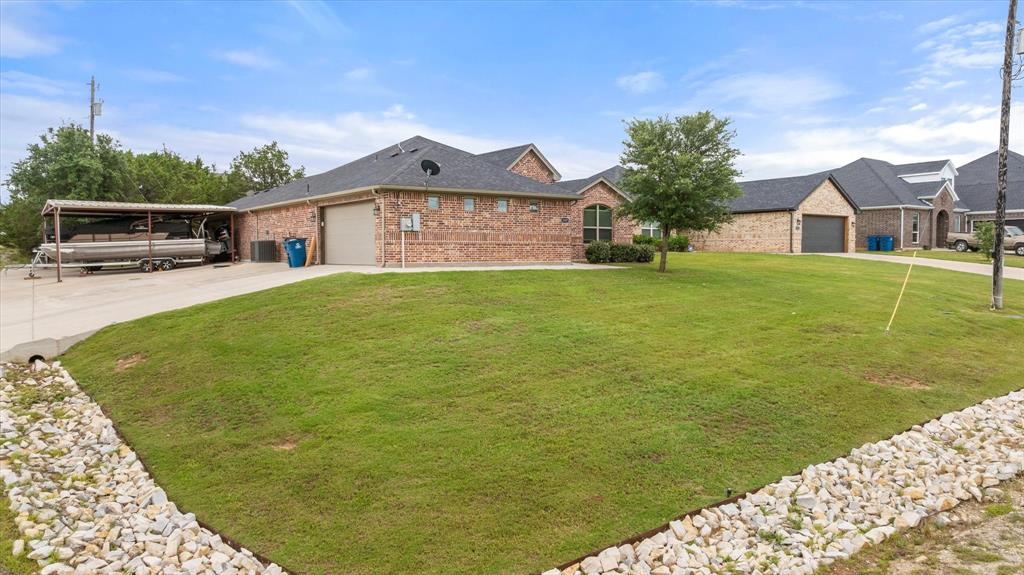 Welcome to 2507 Santiago Drive in Granbury! Built in 2021, this beautifully maintained single-story home offers 3 bedrooms, 2 full baths, and a spacious open-concept layout designed for modern living. The inviting living area flows seamlessly into the kitchen and dining space, creating the perfect setting for entertaining family and friends.
The primary suite features a private bath and generous closet space, while two additional bedrooms provide flexibility for guests, family, or a home office. Ceramic tile flooring offers durability and easy maintenance throughout the main living areas.
Situated in the desirable Canyon Creek community, residents enjoy gated access, community amenities, and convenient proximity to Lake Granbury. The property features a 2-car garage an an additional 1-car garage, 2 covered carport spaces, ample parking,  making it ideal for full-time living or a weekend retreat.
Located within Granbury ISD and just minutes from shopping, dining, entertainment, and the Historic Granbury Square, this move-in-ready home offers the perfect combination of comfort, convenience, and value.