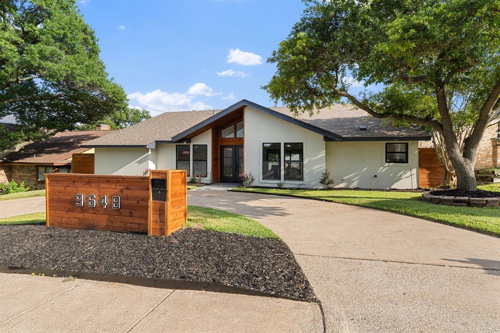 From the moment you step through the door, this updated Lake Highlands mid-century Ranch feels like a breath of fresh air. Sunlight streams across the white oak floors, drawing you into a wide-open kitchen and dining space designed for easy Sunday brunches and crowded holiday dinners, complete with a large island and a premium Whirlpool appliance package. The home’s layout tells a story of perfect balance. On one side, a primary living room centers around a cozy fireplace, while a flexible secondary living space makes for an ideal, quiet home office. When the Texas afternoon hits its peak, massive sliding glass doors invite you straight out to your own private backyard pool oasis. The main floor hosts two bright secondary bedrooms sharing a double-vanity Jack-and-Jill bath, alongside a spacious primary suite featuring a freestanding soaking tub and separate shower. Upstairs, a private fourth bedroom functions as its own secluded suite, offering guests or family an independent retreat with a massive walk-in closet and bath. Finished with a front circle drive for effortless guest parking, an epoxy-floored two-car garage, and quick access to local grocery spots and highways, this home is ready for its next chapter.