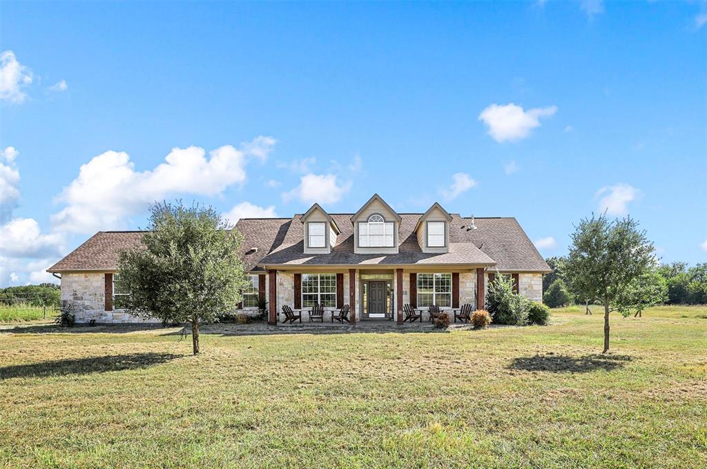This exceptional property boasts a gorgeous home. Nestled in the heart of natural beauty, this remarkable 40+ acre ranch presents an extraordinary opportunity to embrace a lifestyle of tranquility and opulence. This home has been tastefully updated in 2024 with new flooring, paint, remodeled bathrooms, kitchen with new cabinetry, granite countertops, and all new appliances. An open floor plan with breathtaking majestic views of the land. This 2,775-square foot home offers a gated property, 4 bedrooms, 3 baths, 2 living areas, a formal and family dining room, stone fireplace, an office, 2 car garage and a storm shelter on site. Entertainment area out back includes a saltwater pool with a stoned waterfall, and on the land you will find a creek, 3 large pastures for grazing, 3 ponds, riding arena, 4-stall horse barn, shop, wash area, covered hay storage, tack building, insulated workshop, carport to park your RV, boats, or store additional farming equipment. This stunning ag exempt country estate property comes with everything you need. Offering unparalleled privacy while being just minutes from downtown. It exemplifies the pinnacle of ranch living! Whether you seek a serene haven or a space to indulge in equestrian pursuits, this estate offers the perfect fusion of elegance and functionality. The perfect seclusion sought after by many.