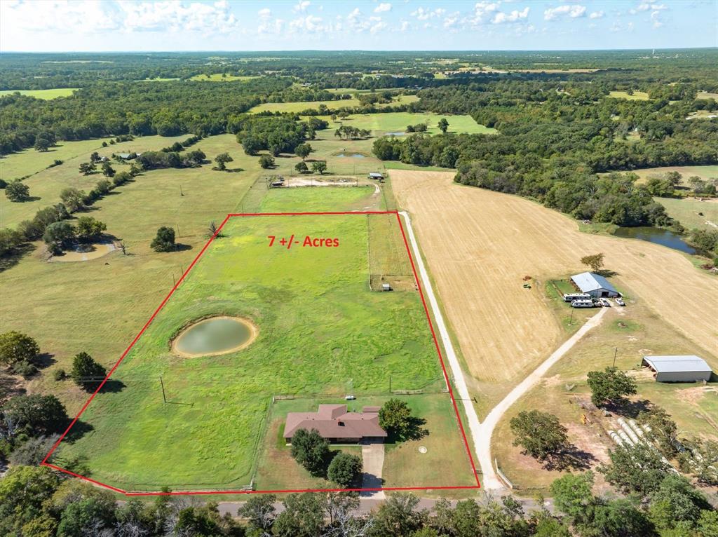Located in the highly sought after Canton Independent School District, this property offers a well maintained three bedroom two bathroom home situated on 7 ag exempt acres surrounded by open pastures and natural beauty. With no homes in the immediate vicinity, you will enjoy a rare sense of privacy and tranquility that is hard to find. Step inside to discover two spacious living areas that provide flexibility for both entertaining and everyday living. One living area features a cozy wood burning fireplace that creates a warm and inviting atmosphere, perfect for relaxing evenings at home. The expansive kitchen is a true highlight, complete with custom wood cabinetry, abundant countertop space, and ample storage, making it ideal for cooking, hosting, and gathering with family and friends. Outdoor living is just as impressive with a large covered deck stretching across the back of the home, offering the perfect space to unwind, entertain guests, or take in the peaceful views of the surrounding countryside. The property also includes a two car carport and a storage building, adding both convenience and functionality. For buyers seeking less land, the home and 1 acre are available for purchase. See MLS 21224194 for additional details.