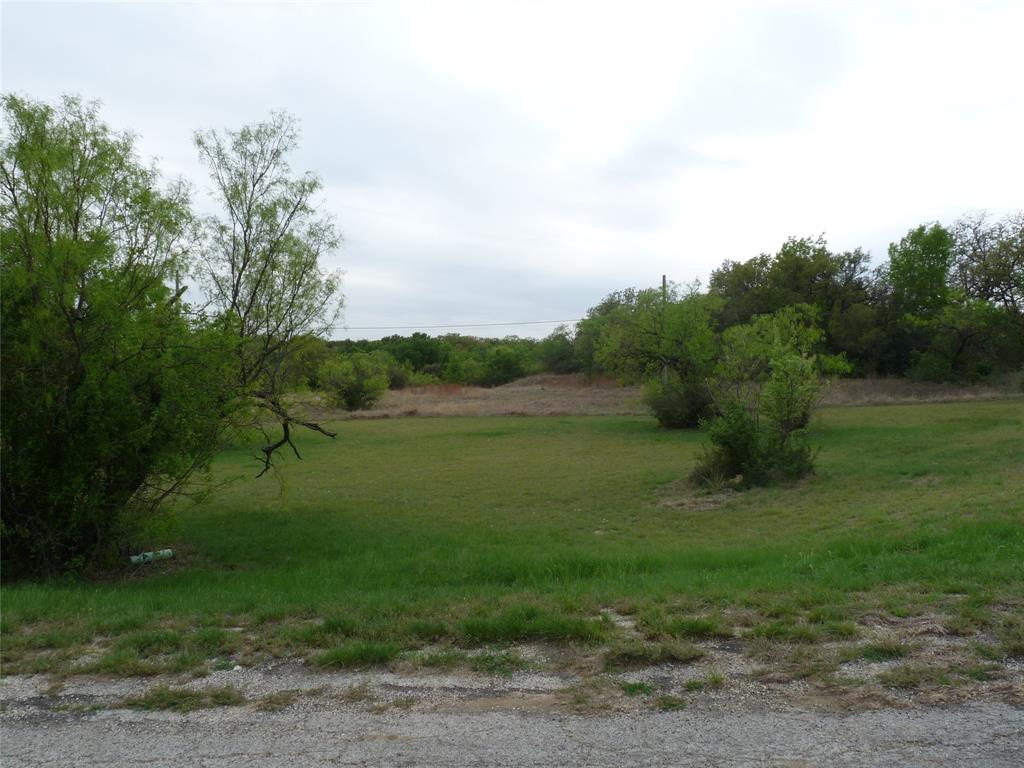 Your future homesite awaits in the sought after Runaway Bay community! This ready to build lot is perfectly positioned near the golf course and just moments from Lake Bridgeport, offering endless opportunities for boating, fishing, and outdoor fun. Utilities including city water and sewer, electricity, internet, and cable are available, making it easy to bring your vision to life. Bring your builder and start turning your dream home into reality! Need more space? This is one of three available lots, and the seller is open to selling all three together, an excellent opportunity for a larger homesite or investment potential! The MLS # associated with the other two lots are 21224502 & 21221110