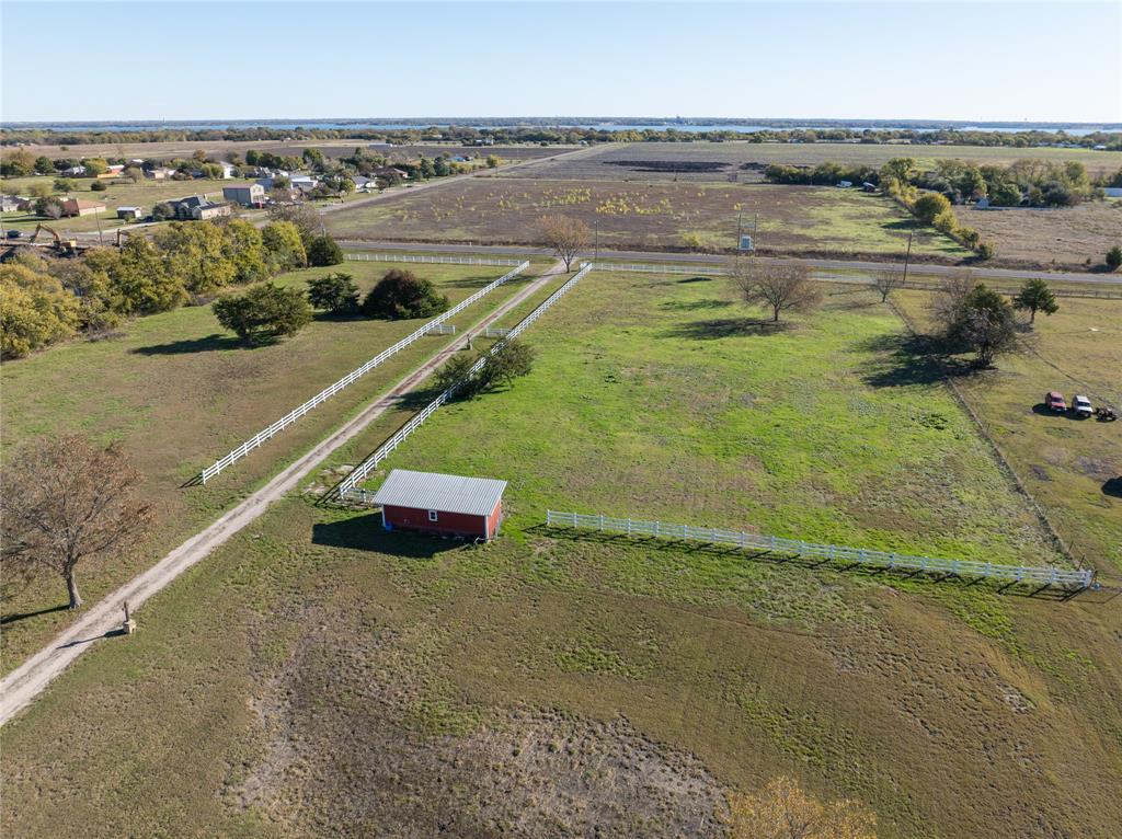 JTACR Real Estate Group is pleased to present this Princeton land opportunity: a 11 acre site which previously operated as a wedding venue with a 2 story single family home, large warehouse, underground pool, out buildings, pavilion, all with a beautiful aesthetic of pasture and partially wooded area. The site is outside of city limits, but in the city of Princeton, the 3rd fastest growing city in the United States!
With over 25,000 single family units completed and proposed, the Princeton market is aggressively growing, and with that, the demand for additional housing solutions, commercial development, and more.
Current ownership has obtained site plans for proposed flex use at the front of the property; and has also obtained engineering for a 96 site tiny home and RV community and will provide all completed plans and studies for the development. Existing utilities include electricity, water, and on site septic
This opportunity presents investors with a unique opportunity to develop around an already unique venue to either use the venue or demo parts of the existing project and finish the development around those features.