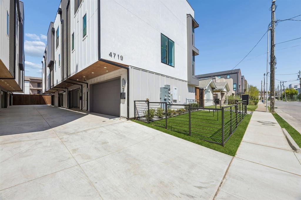 Rooftop views of Downtown Dallas + brand-new construction—urban living at its finest. This multi-level condo by GM Elite Custom Homes offers thoughtfully designed living with elevated finishes and modern functionality throughout. Light-filled interiors and an open-concept layout create a seamless space for both everyday living and entertaining.

The home features a gated front entry, private driveway, and attached two-car garage, combining convenience with security. Inside, light wood flooring and designer finishes carry throughout.

All three bedrooms include en-suite baths, offering privacy and flexibility. The ground-level bedroom is ideal for guests, a home office, or additional living space.

The second-floor kitchen and living area serve as the heart of the home, featuring a magazine-worthy kitchen with a large eat-in island, top-tier appliances, custom soft-close cabinetry, and sleek countertops.

The primary suite offers a relaxing retreat with a spacious walk-in closet, double vanity, and a beautifully designed shower.

The top level opens to a private rooftop deck with Downtown Dallas views, perfect for entertaining or unwinding above the city.

A perfect blend of contemporary design and refined finishes—offering elevated urban living in a prime Dallas location.