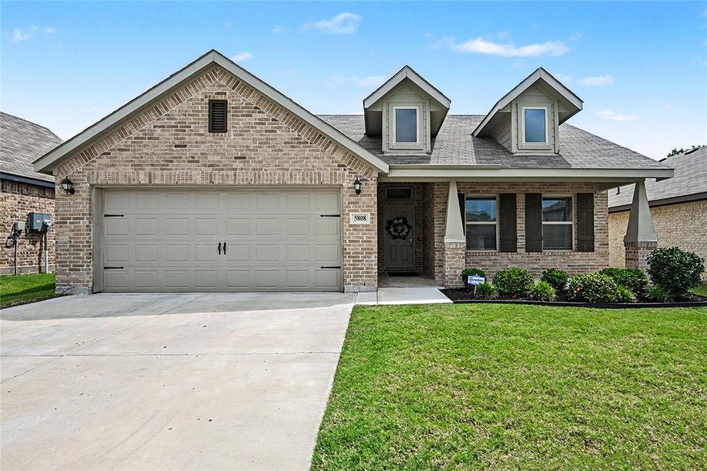 Built in 2023, this beautifully maintained 3-bedroom, 2-bath home with a 2-car garage offers 1,854 sq ft of modern living. Move-in ready with refrigerator, microwave, dishwasher, and electric range included! The open-concept layout features a California-style kitchen with espresso cabinetry, granite countertops, an oversized island with sink and bar seating, and a walk-in pantry overlooking the spacious living area. Ceramic tile floors enhance the main living spaces, with carpet in the bedrooms. The private primary suite accommodates a California King and offers dual vanities, a glass-enclosed shower, linen storage, and a large walk-in closet. Enjoy a fenced backyard with sprinkler system, plus a mudroom and separate utility room. Conveniently located in Eagle Mountain-Saginaw ISD near shopping, dining, and everyday conveniences.