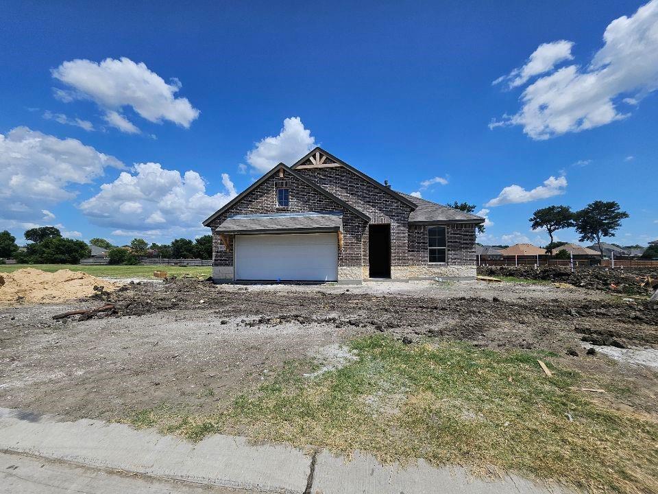 Estimated September 2026 completion! Ask us about our Trade-In Trade-Up Program-we can buy your home when you buy ours! The Lavon floor plan provides all the space needed for a growing family. Welcomed by a pillared front porch, the long foyer opens into a grand family room complete with a fireplace. Gathering in this home is easy with the seamless transition from room to room. The kitchen is positioned against the back wall as the stage so you can look out and observe all things going on. With three equally-sized spare bedrooms, you’ll have space for your family and any visitors. A walk-in mudroom off the garage allows for more storage of shoes, bags, and all your day-to-day items. The Lavon home is perfect for a busy and active family needing space to come together as well as everyone’s own private space. The owner’s suite is a perfect getaway, tucked in the back corner past the family room. Entering this space, you’ll have a splendid view into the backyard. All the natural light will make this oasis feel even more tranquil. The bedroom leads into the owner's bath with a double-sink vanity, stand-up shower, and tub perfect for unwinding after a long day. There’s no shortage of storage in this luxurious ranch-style home with closets in every room, extended countertops in the kitchen, corner pantry, and coat closet. Bring your family home to the Lavon floor plan and enjoy all the comfort of room to spread out and relax, teamed with the highest quality product.