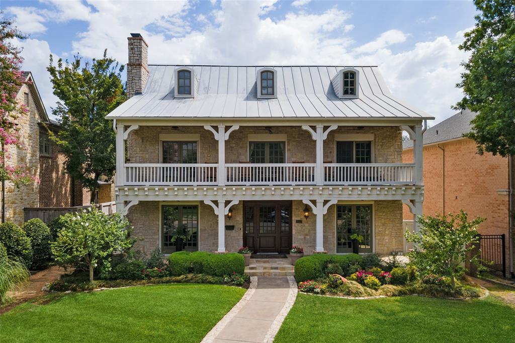 Set on a treed 60’ lot, one block away from Goar Park, in the heart of University Park.  Built in 2000, this solid stone home, with historic deep porches and 42 ft. balcony, has a wide open floor plan with 4 beds and 4.1 baths.  Gameroom with full bath could be a 5th bedroom.  Warm and welcoming entry, flanked by formals, leads you to great room with natural stone walls, WBFP, walk in wet bar with ice machine.
Private paneled study with built ins is off of the entry.
Oversized kitchen and breakfast room enjoys a large center island, gas cooktop, dbl ovens, subzero, 2 refrigerator drawers by second sink.  Perfect for entertaining large gatherings.  Walk in Pantry and butler’s pantry boasts additional wine storage.
Upstairs has wide hallways, leading you to 4 bedrooms, laundry rm with built ins and sink and the game room with full bath.  For more info, see Private Remarks.