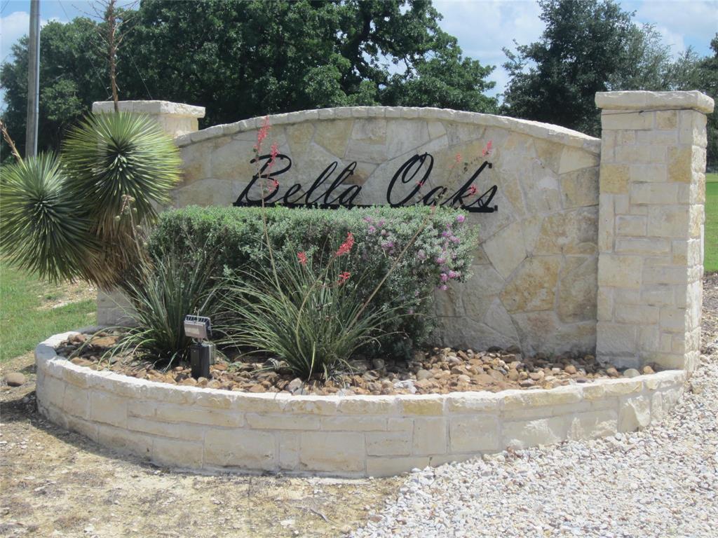 Build your dream home on this beautiful 2.013-acre homesite tucked away in the peaceful cul-de-sac of Bella Oaks in Tolar. Surrounded by mature trees and offering plenty of privacy, this property provides the perfect blend of country living and neighborhood convenience. Utilities are installed with access to co-op electricity, and the lot is eligible for a private well. Bring your own builder and create the custom home you've always wanted, with a minimum 2,700-square-foot build requirement and outbuildings permitted. Located within highly sought-after Tolar ISD, this scenic property offers endless possibilities to create your own private retreat.