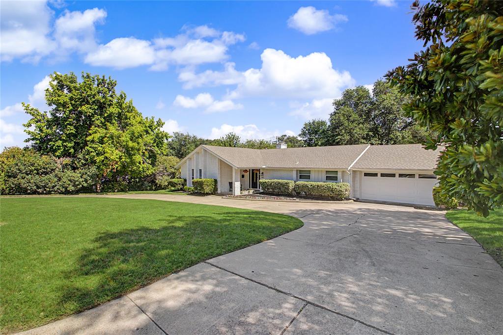 Welcome to 1921 Dakar Road East.  The sweeping circular driveway offers a grand driveup and ample guest parking.  The covered front porch opens onto the foyer entry; from there, the remodeled kitchen and pantry is to the right, which leads to the breakfast area, bar seating and garage access.  The foyer and the kitchen both offer entry into the expansive living room and dining room areas.  To the left of the foyer is the hallway with access to the 3 ample bedrooms and 2 remodeled bathrooms.  2 of the bedrooms feature large walk-in closets and the third bedroom features two separate closets with plenty of storage and private access onto the flex space, which is also accessible from the living room.  The flex space has lots of natural light and currently functions as a playroom with entry into the back walkway to fire pit, large shade tree and expansive back yard.  Newer roof, HVAC, water heater and garage door opener with myQapp; see documents for complete list and timeline of improvements.  Schedule your showing today!