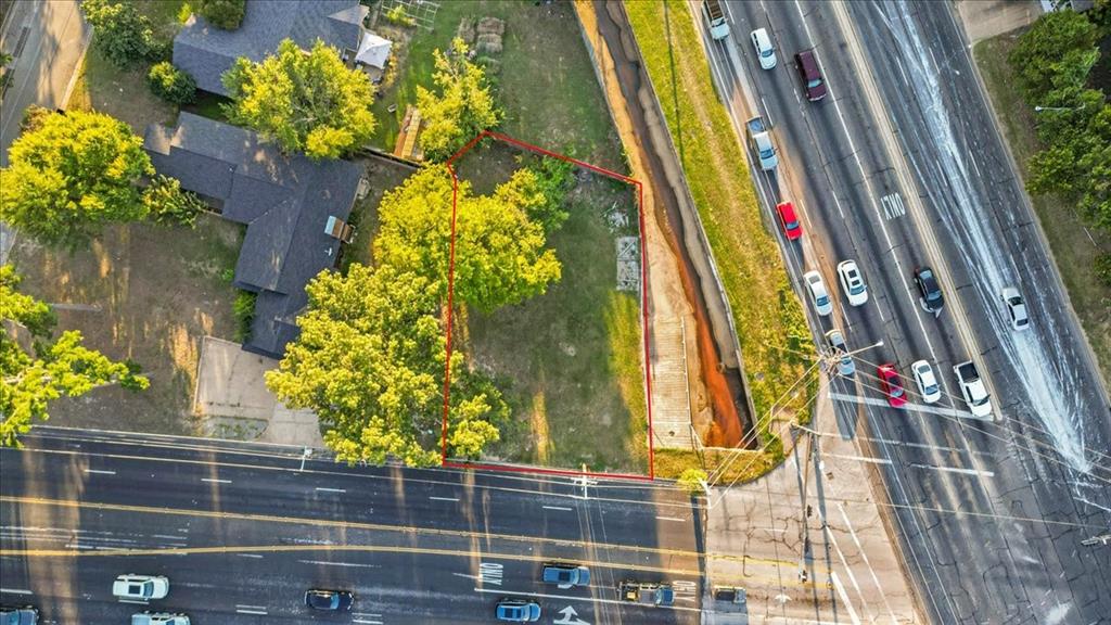 Prime corner lot opportunity located at the highly visible intersection of S SE Loop 323 and Paluxy Drive. Currently zoned residential, the property offers the perfect setting to build a home near top rated public schools and T.K. Gorman private school, all within one mile. With its excellent exposure and high traffic location, this lot also presents the potential to request a zoning change for commercial use through the City of Tyler. Enjoy unbeatable convenience with Starbucks, 7Brew Coffee, Crunch Fitness, Walmart, Super-One, Texas Roadhouse, Chick-fil-A, medical clinics, and much more all within walking distance. Survey is in hand, lot is cleared and ready to build. Whether for a beautiful new residence or an investment opportunity with commercial potential, this corner lot is full of possibilities!