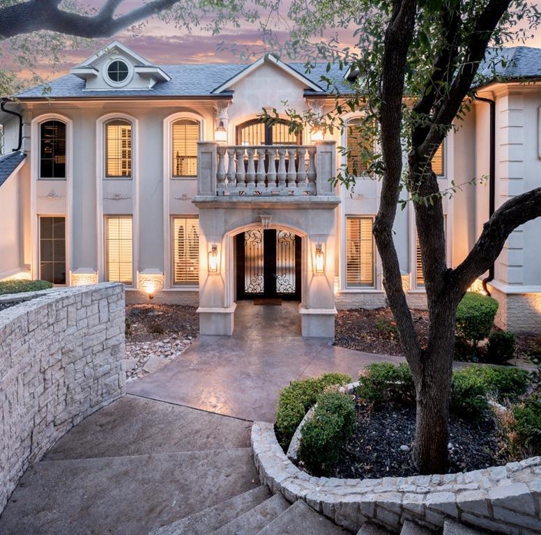 Incredible custom home sits on a beautifully landscaped cul-de-sac lot convenient to highways, restaurants and shopping while giving the impression of total escapism.  Backing to a creek, this three story home features high end luxury and undeniable privacy.  Boasting extensive, recent renovations, this 5 BR, 5.5 bath home impresses with ELAN smart home automation, featuring security cameras, climate control, lighting, and Sonos speakers throughout, a chef's kitchen with 4 inch viking range and ge profile side by side refrigerator, media room with 120 inch screen and custom control center, guest quarters with separate entrance including a luxurious bathroom, kitchenette, and private covered patio with direct access to the heated pool and spa. Recently installed HVACs and new roof. Enjoy idyllic sunrises and golden hours from one of the many terraces overlooking the lush gardens and backyard oasis.