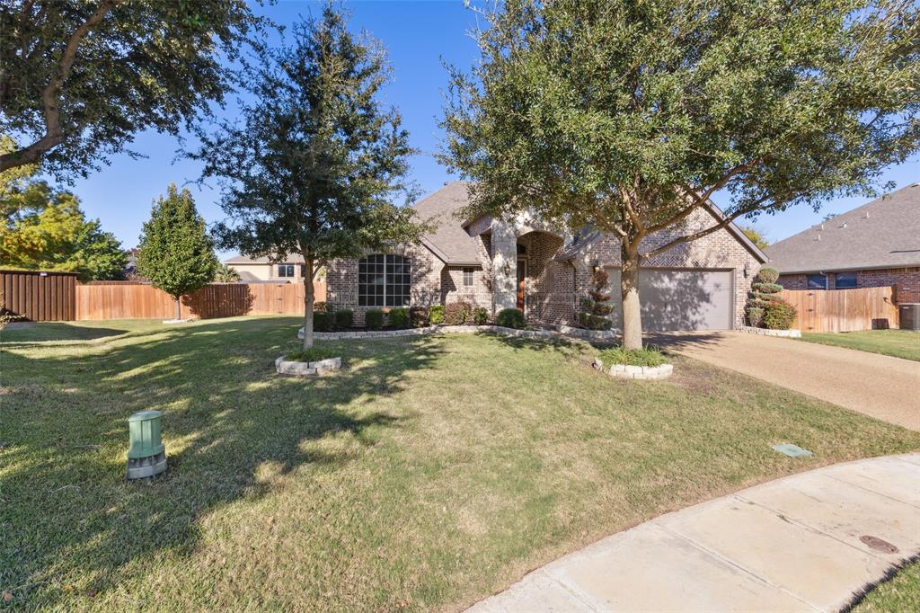 Seller will provide a new Fridge, washer & dryer at list price! Almost a third of an acre oversized lot with an upscale finish out! Intricate brick work with stone on the front elevation makes for impressive curb appeal, covered front porch, 8ft front door, high ceilings, cast stone fireplace, gas logs, wood floors in all bedrooms, formal dining & living area, raised baseboards throughout, crown molding, bay window option in the master suite, double sinks, jetted tub, separate shower, huge walk-in closet, split bedrooms, spacious private laundry room instead of the typical 'walk-through to garage' set up!  Front & back glass storm doors, storage shed in backyard, full sprinkler system, raingutters, solar shade screens, work-space & cabinets in garage, radiant-barrier roof decking, HVAC replaced within the last 2 years, water heater replaced within the last 2 years! Fox Hollow is a sought after established community in the heart of Forney with city services instead of MUD services!
