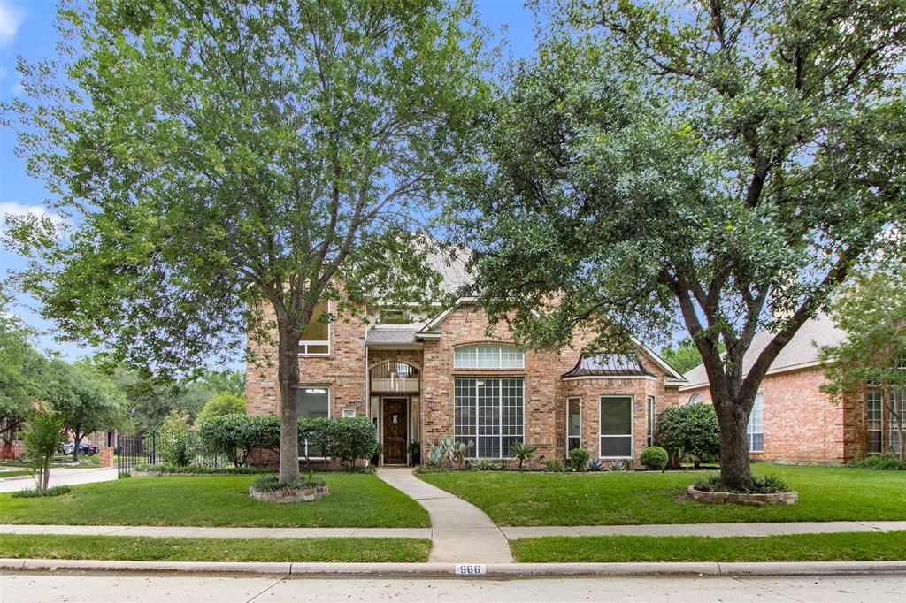 This inviting 5 bedroom, 4.5 bath home offers charm and functionality on a beautiful corner lot in sought-after Gibbs Station. Zoned to Highly rated Coppell ISD. A showcase chandelier in the foyer warmly welcomes you, setting the tone for elegance throughout. The thoughtfully designed layout includes a spacious primary suite & mother-in-law or guest suite on the main floor, offering flexibility for multi-generational living or guests. The main level also features a large living room & a beautifully positioned dining room overlooking the backyard garden, where you can enjoy serene views & hear birds chirping in the morning, creating a peaceful, nature-connected dining experience. Upstairs offers three additional bedrooms with two full baths & a generous game room, perfect for movie nights, hobbies, or play. At the heart of the home is the open, updated kitchen with granite countertops, abundant built-in cabinetry, stainless steel gas range, secondary electric oven, granite sink, ample workspace for cooking and entertaining. Gorgeous hand-scraped hardwood floors extend throughout the main level, complemented by iron balusters for a modern feel. The home has been extensively updated with fresh interior, exterior paint, contemporary hardware and fixtures, brand-new high-end energy-efficient windows in most rooms, upgraded electrical outlets with built-in USB charging, and a beautifully renovated primary bathroom with modern finishes. A dedicated home office will soon feature a brand-new floor-to-ceiling window, enhancing natural light and function. The backyard feels like a private garden retreat—beautifully sized and designed, offering a peaceful outdoor setting with room for a dog to roam, relax, and play. Ideally located with quick access to Hwy 121, I-35, and George Bush Turnpike, plus nearby shopping, dining, parks, and gyms, and just 15 minutes to DFW Airport. Combining luxury, privacy, and lifestyle, this home is truly one of a kind.